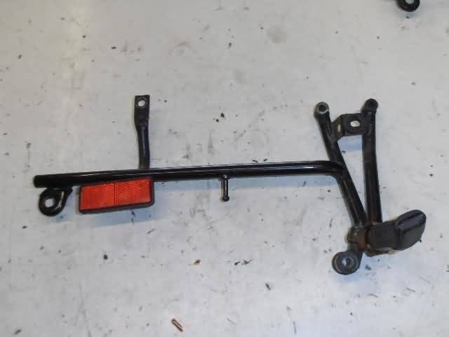 Honda CBR600F(PC23) Footpeg bracket left with reflector